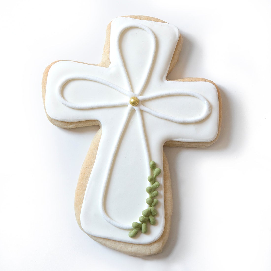 Cross Decorated Cookie Favor with greenery The Sugar Bakery