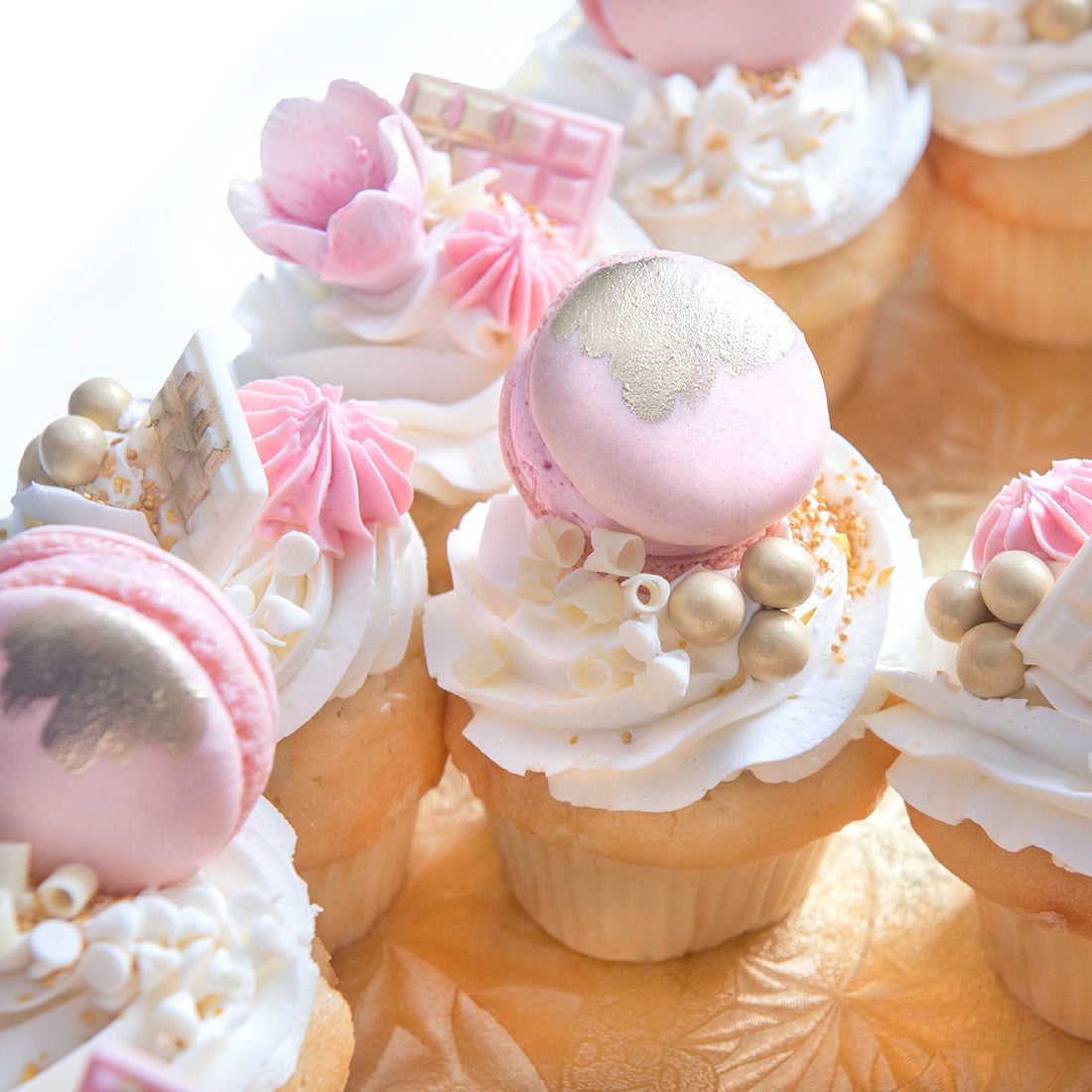 Pink and gold cupcakes for sales baby shower
